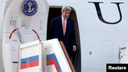 U.S. Secretary of State John Kerry disembarks from his plane upon his arrival at Vnukovo International Airport in Moscow, Russia, July 14, 2016.
