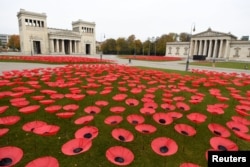 Poppy flowers are seen at Koenigsplatz in Munich, Germany, Nov. 3, 2018, as Europe prepares to mark the centenary of the ending of World War I.