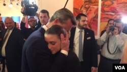 Far right candidate Norbert Hofer hugs his daughter after his election defeat Sunday, Vienna, Austria, Dec. 4, 2016. (L. Ramirez/VIA)