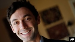 FILE - Democratic candidate for Georgia's 6th congressional district Jon Ossoff poses for a portrait in Atlanta, Feb. 10, 2017.