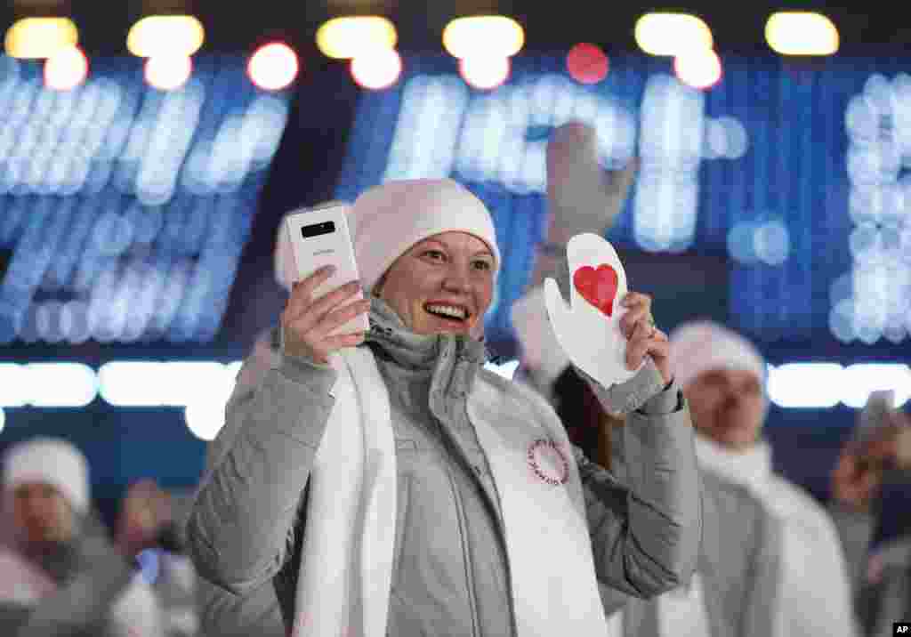 A Russian athlete waves during the opening ceremony of the 2018 Winter Olympics in Pyeongchang, South Korea, Feb. 9, 2018.