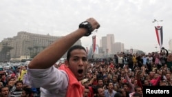 University students and supporters of the Muslim Brotherhood occupy Tahrir Square in Cairo, Dec. 1, 2013. 