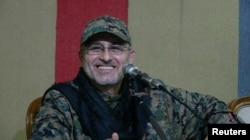 ທ້າວ Mustafa Badreddine ຜູ້ບັນຊາການທະຫານຂອງກຸ່ມ Hezbollah.