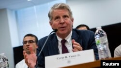 FILE - Manhattan District Attorney Cyrus Vance testifies at a hearing in New York, January 29, 2014. 