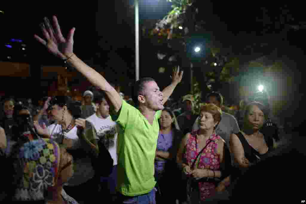 Opposition supporters celebrate in Caracas.