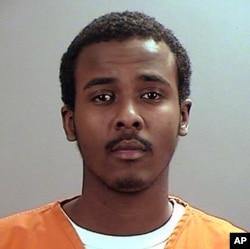 Undated file photo provided the Sherburne County, Minn., Sheriff’s Office shows Abdirahman Yasin Daud, one of several Minnesota men accused of conspiring to travel to Syria to join the Islamic State group.