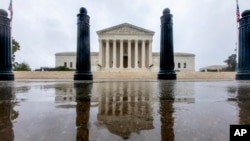 The Supreme Court is seen in Washington, Sunday, Sept. 23, 2018. With the opening of the high court's new term approaching, President Trump is anxious for his Supreme Court nominee Brett Kavanaugh to be confirmed by the Senate.