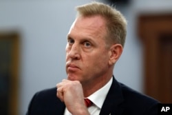 Acting Defense Secretary Patrick Shanahan listens,May 1, 2019, during a House Appropriations subcommittee on budget hearing on Capitol Hill in Washington.