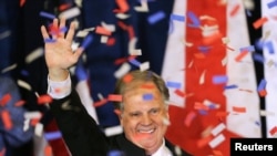 Democratic Alabama U.S. Senate candidate Doug Jones acknowledges supporters at the election night party in Birmingham, Alabama, Dec. 12, 2017. 