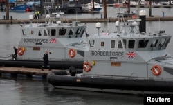 FILE - Border Force vessels of the British Coastal Patrol are seen in Ramsgate harbor, Britain, Jan. 4, 2019.