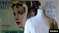 FILE - A mannequin is seen with a dress worn by Grace Kelly in the film "The Swan" in an exhibition of the late star's wardrobe at the Victoria and Albert Museum in London, April 15, 2010.