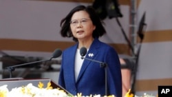 Taiwanese President Tsai Ing-wen delivers a speech during National Day celebrations in front of the Presidential Building in Taipei, Taiwan, Oct. 10, 2021.