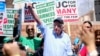 FILE - Vermont Sen. Bernie Sanders greets workers at a rally at the University of California Los Angeles, March 20, 2019. 