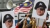 US Charges Former Goldman Bankers in Malaysian Fund Scandal