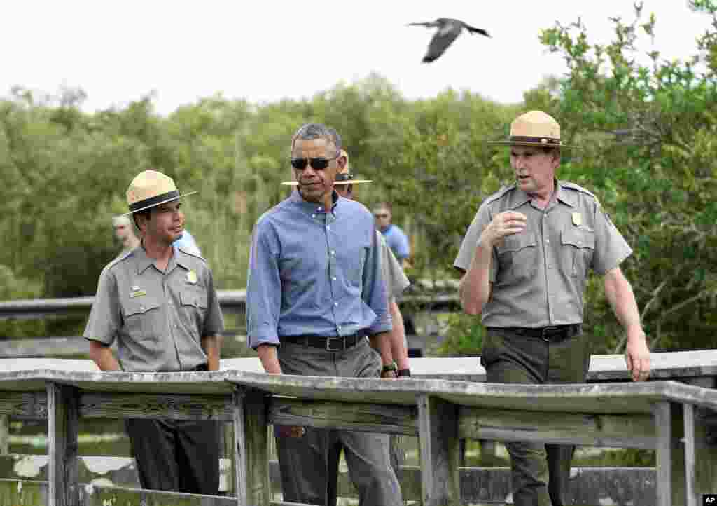 President Barack Obama walks the Anhinga Trail at Everglades National Park, Florida, April 22, 2015.