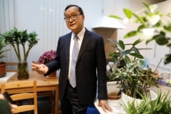 Self-exiled Cambodian opposition party founder Sam Rainsy speaks during an interview with Reuters before his departure to Cambodia via Bangkok on Thursday from his Paris base, France, November 6, 2019.