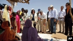 UN delegation members meet with women in the Abu Shouk Internally Displaced Person's camps (IDP) on the outskirts of El Fasher, the administrative capital of North Darfur, 08 Oct 2010