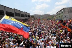 Supporters of Venezuelan opposition leader Juan Guaido take part in a rally against Venezuelan President Nicolas Maduro's government, in Valencia, Venezuela, March 16, 2019.