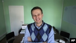 Corporate Russian lawyer Alexei Navalny poses in his office in Moscow, Russia (File 2010)