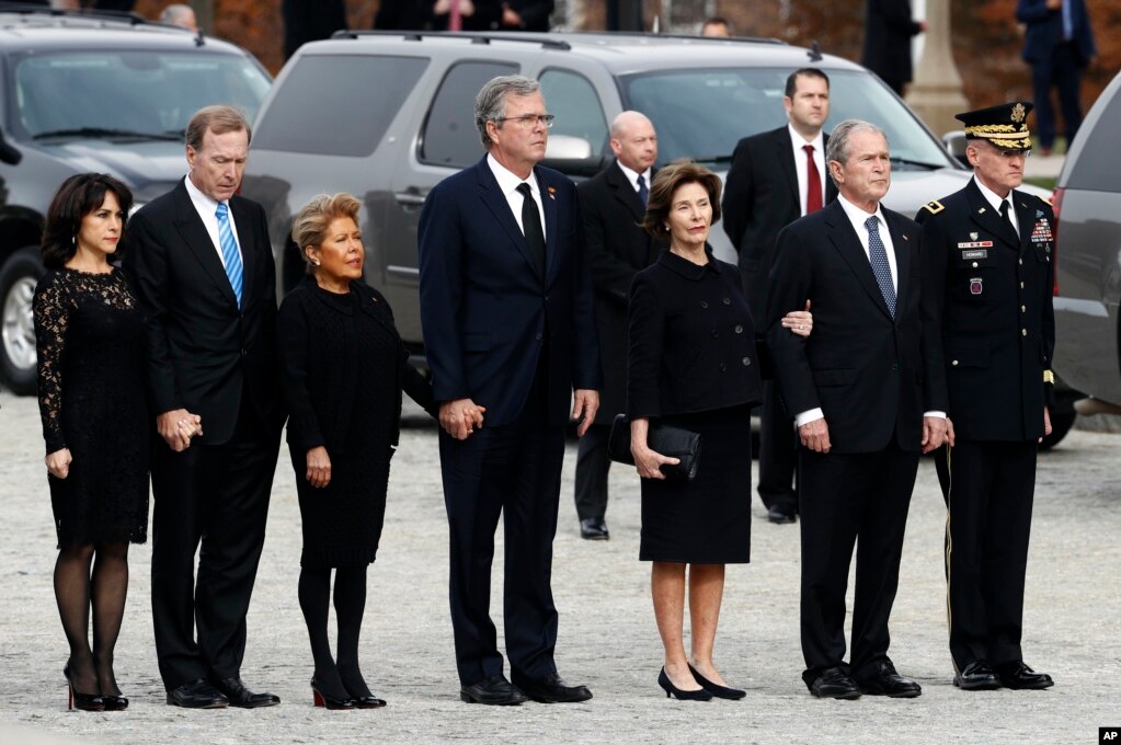 From left, Maria and her husband Neil Bush, Columba Bush, former Florida Gov. Jeb Bush, former first lady Laura Bush and former President George W. Bush arrive for a State Funeral for former President George H.W. Bush at the National Cathedral, Dec. 5, 2018.