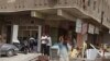 Dozens Killed in Iraq Bombings