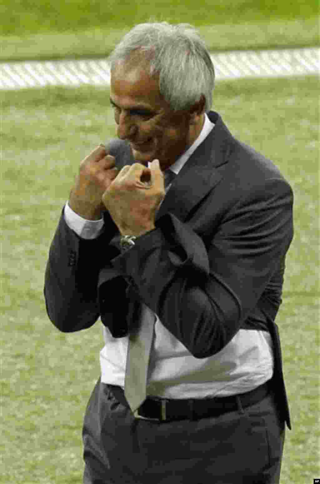 Algeria's head coach Vahid Halilhodzic reacts during the World Cup round of 16 soccer match between Germany and Algeria at the Estadio Beira-Rio in Porto Alegre, Brazil, Monday, June 30, 2014. (AP Photo/Thanassis Stavrakis)