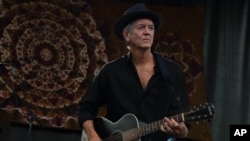 FILE - Rodney Crowell performs at Magnolia Fest at the Spirit of Suwannee Music Park in Live Oak, Florida, Oct. 18, 2014. 