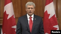 Perdana Menteri Kanada, Stephen Harper, memberikan pernyataan dalam siaran langsung televisi CBC di Ottawa (22/10). 