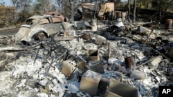 The charred remains of a property is shown near Clearlake, Calif., Aug. 6, 2015.