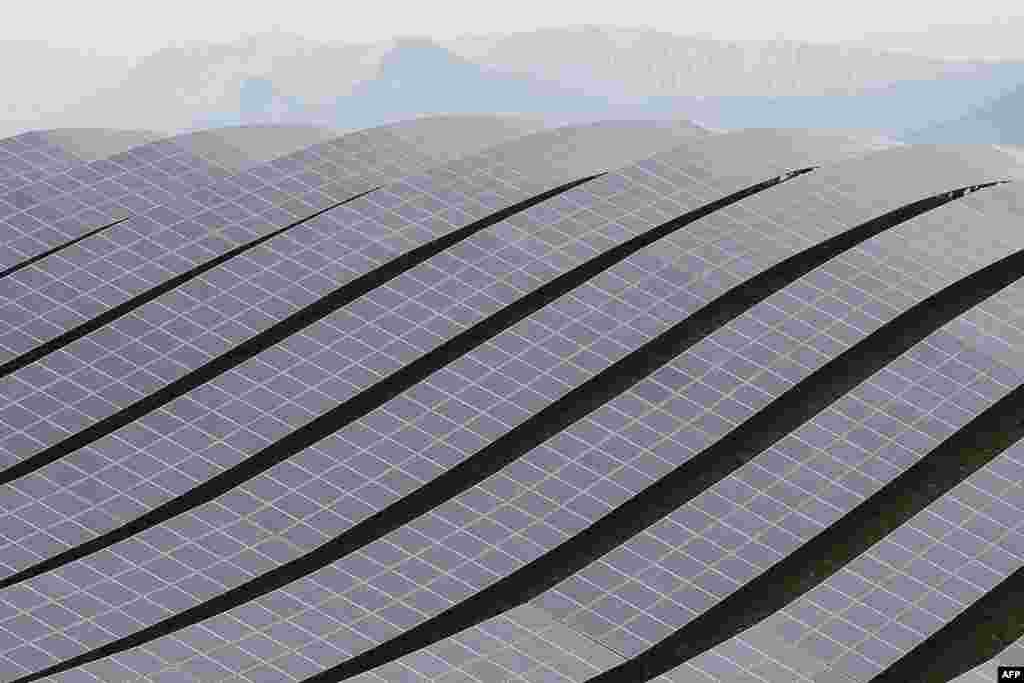 Solar panels are seen at the Les Mees solar power plant in southern France.