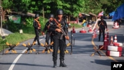 Thai Rangers at a checkpoint where a Thai army vehicle carrying six rangers was ambushed by suspected separatist militants in the Cha nea district in Thailand's restive southern province of Narathiwat on April 27, 2017.