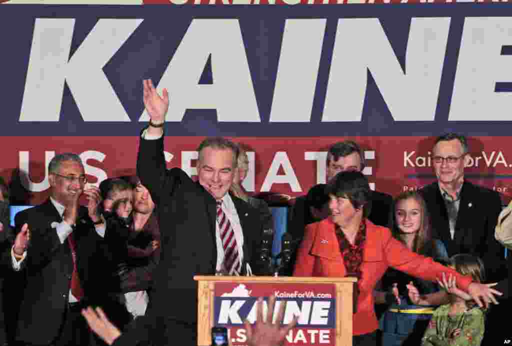 Democratic senate candidate former Gov. Timothy Kaine, and his wife Anne Holton, right, celebrates his win over Republican George Allen during his victory party in Richmond, Nov. 7, 2012.