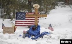 A memorial for Robert “LaVoy” Finicum is seen where he was shot and killed by law enforcement on a highway north of Burns, Ore., January 30, 2016.