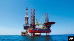FILE - China National Offshore Oil Corporation's (CNOOC) oil rig in Bohai Sea.