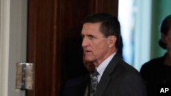 FILE - Then-national security adviser Michael Flynn in seen the East Room of the White House in Washington, Feb. 13, 2017. 