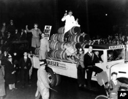FILE: A truck carries a load of beer kegs in a beer parade and demonstration held in Newark, N.J., Oct. 28, 1932. More than 20,000 people took part in the mass demand for repeal of the 18th Amendment to the Constitution. (AP Photo)