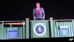 Former President Ronald Reagan appears on a railcar platform making a speech during a whistle stop on the campaign trail, but as a hologram, on display at the Ronald Reagan Presidential Library in Simi Valley, Calif., Oct. 10, 2018. 