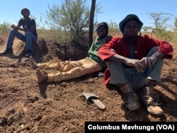 Illegal miners resting at Nugget Mine in Matopo district.