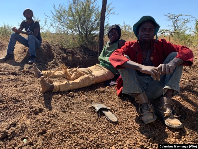 Illegal miners resting at Nugget Mine in Matopo district.