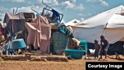 FILE: A pile of personal property left in the open at the Chingwizi transit camp. Hundreds of families lost their property during their relocation to the camp. (Photo: Human Rights Watch)