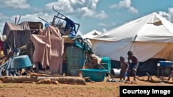 A pile of personal property left in the open at the Chingwizi transit camp. Hundreds of families lost their property during their relocation to the camp. (File Photo: Human Rights Watch)