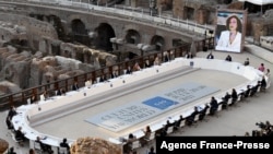 Culture Ministers of the G-20 take part in a roundtable at the opening of their meeting at the Colosseum on July 29, 2021 in Rome.