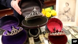 Diamond tiaras are on display at Bradley & Skinner, an antique and period jewelry specialist, in London, April 5, 2018. Meghan Markle will have access to one of the world’s most remarkable jewelry collections for her wedding to Prince Harry. London jewelers are hoping Markle will bring tiaras back in fashion when she walks down the aisle May 19.