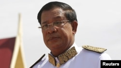 FILE - Cambodian Prime Minister Hun Sen attends the funeral ceremony of Chea Sim, Cambodia's late former senate president and head of the ruling Cambodian People's Party (CPP), in Phnom Penh, June 19, 2015. 