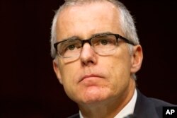 FILE - Then-acting FBI Director Andrew McCabe listens on Capitol Hill in Washington, May 11, 2017, while testifying before the Senate Intelligence Committee hearing on worldwide threats.