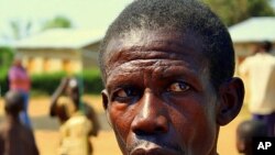 Antoine, a farmer, says he has lived near the park for three years, and has trouble feeding his family because animals raid his crops