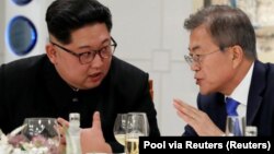 Лидер Северной Кореи Ким Чен Ын и президент Южной Кореи Мун Чжэ Ин