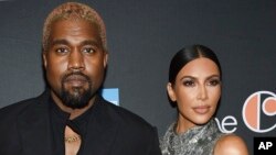 FILE - Kanye West and Kim Kardashian West attend "The Cher Show" Broadway musical opening night at the Neil Simon Theatre.