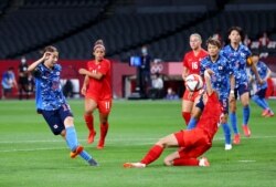 Pertandingan sepak bola putri Olimpiade Tokyo 2020, Grup E, antara tim Jepang melawan Kanada di Sapporo Dome, Sapporo, Jepang, 21 Juli 2021. (REUTERS/Kim Hong-Ji)