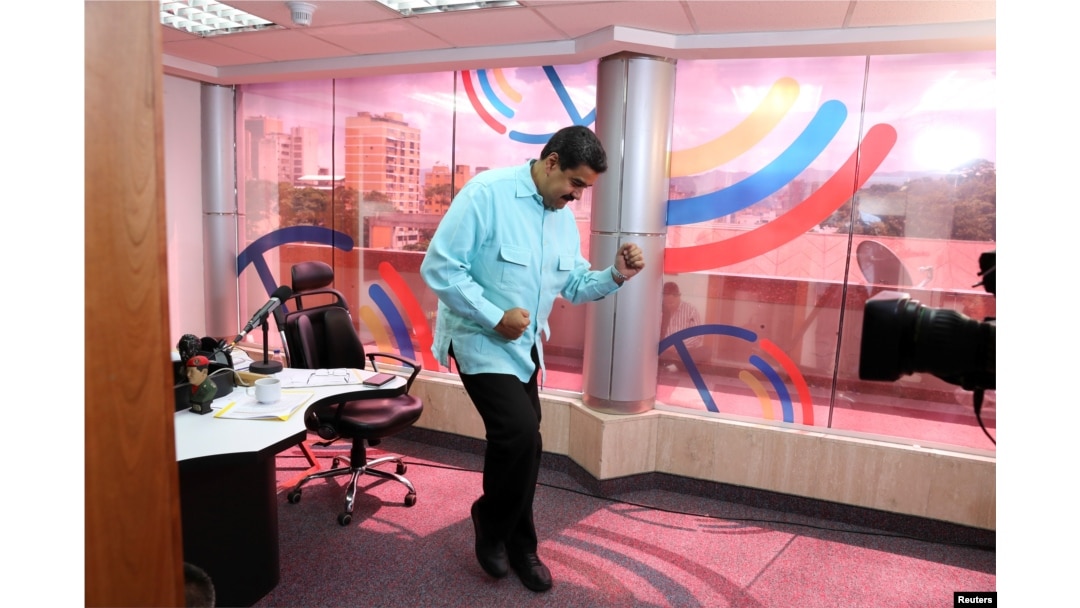 Venezuela's President Nicolas Maduro dances during his radio program at Miraflores Palace in Caracas, Venezuela, Nov. 1, 2016. (Miraflores Palace/Handout)
